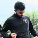 High Neck Black Full Sleeve Cotton Blend T-shirt with Head Hunters Naga Skull and Logo Print